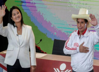 Supporters of Peru’s competing presidential candidates take to roads amid election frenzy